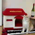 Bright and playful red-and-yellow cat bed, inspired by McDonald's iconic color scheme.
