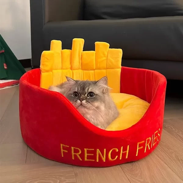 A happy cat curled up inside the cozy French Fries Cat Bed, enjoying a comfortable nap.