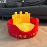Side view of the French Fries Cat Bed, featuring a semi-enclosed, breathable design.