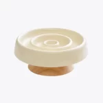 Tri-Color Ceramic Slow Feeder Cat Bowl with a wooden stand, designed to prevent fast eating.