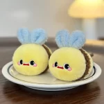 A cat chewing on the Matatabi bee toy, enjoying its natural silvervine stick.